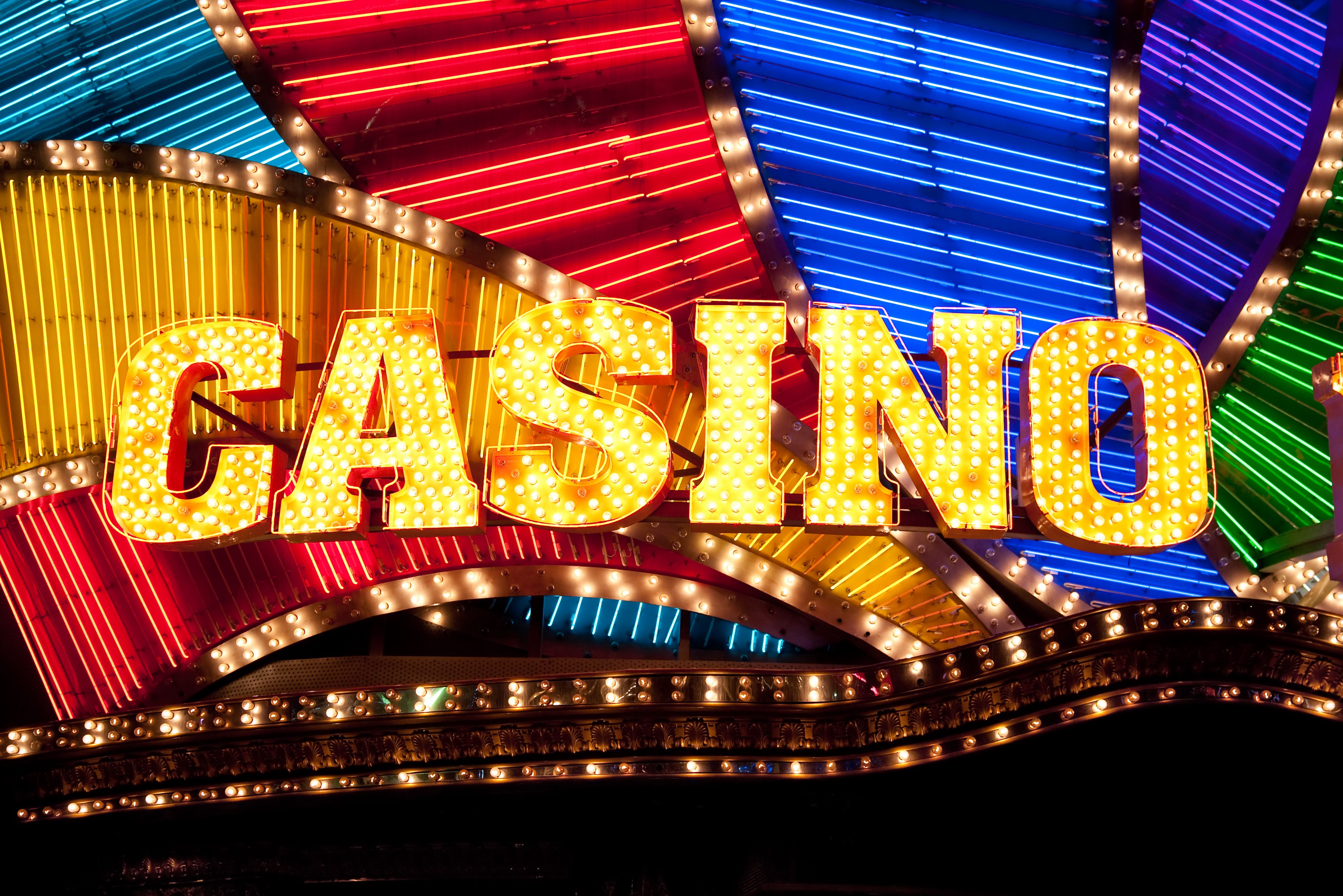 A vibrant graphic showcasing the Cash Tornado Slots logo and a whirlwind of gold coins.